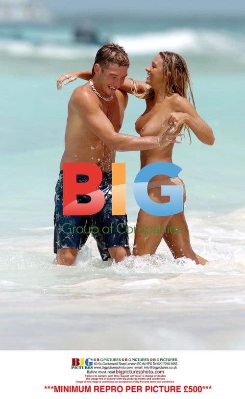 Jodie Marsh and Boyfriend Topless on Beach