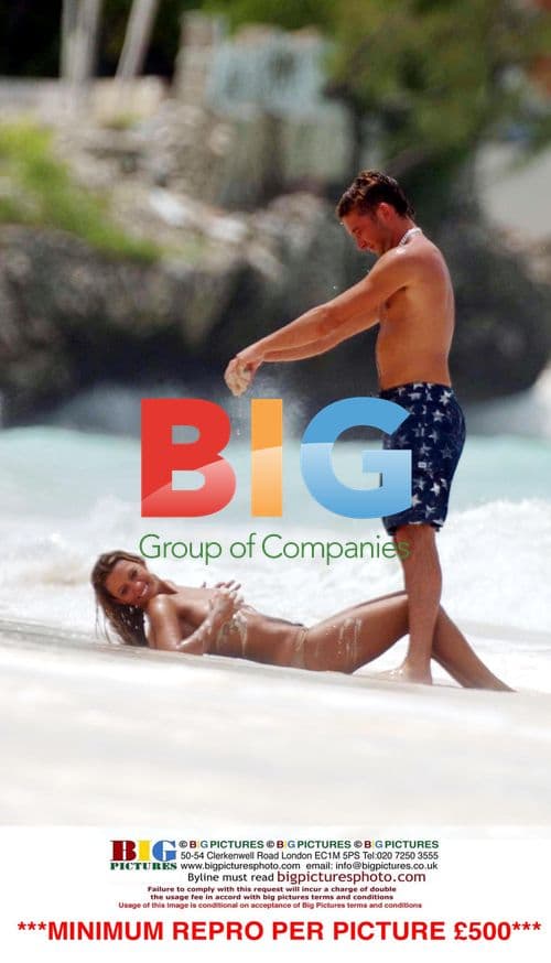 Jodie Marsh and Boyfriend Topless on Beach