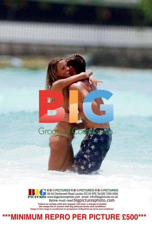 Jodie Marsh and boyfriend topless on the beach