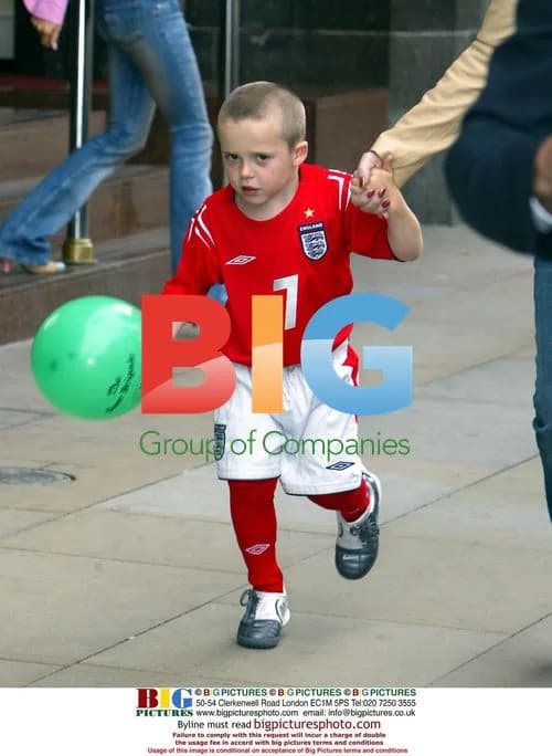 Brooklyn Beckham leaves hotel to watch dad