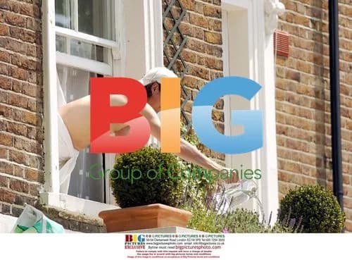 Vernon Kay Tends to Window Box