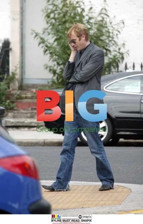Rhys Ifans Talking on Phone in London