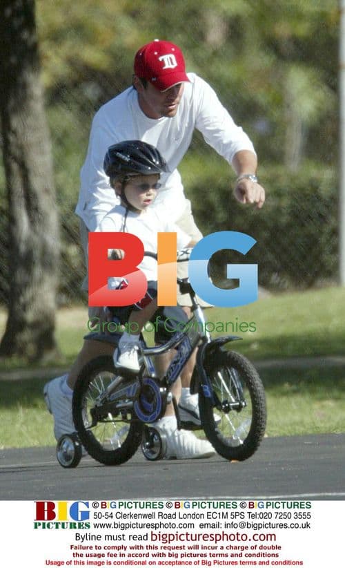 Dean Cain Buys Son Christopher First Bike