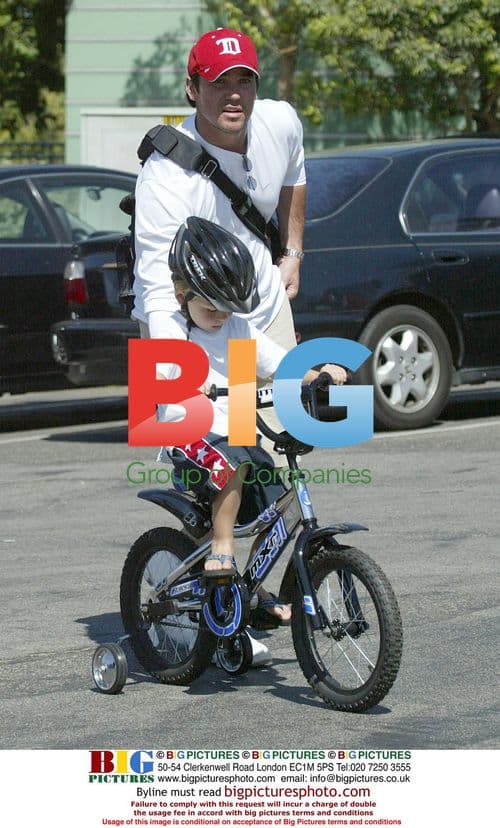 Dean Cain Buys Son Christopher His First Bike