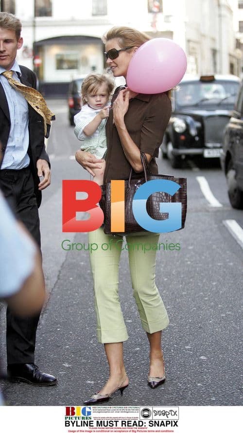 Elle Macpherson and son Aurelius leaving restaurant