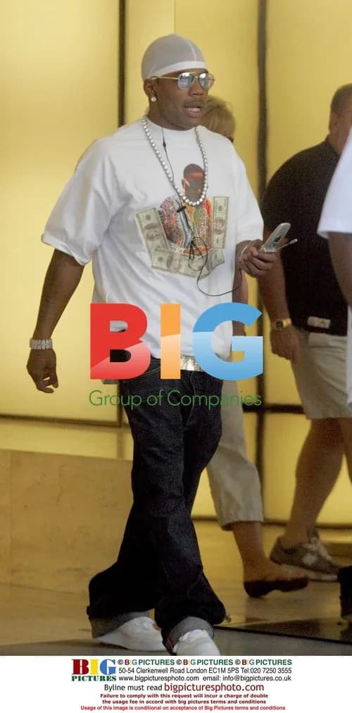 Nelly Out Shopping with Fans in Beverly Hills