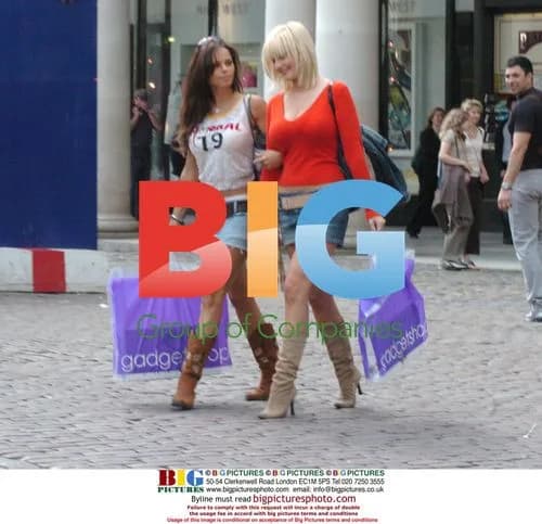 Glamour models shopping with Robosapien