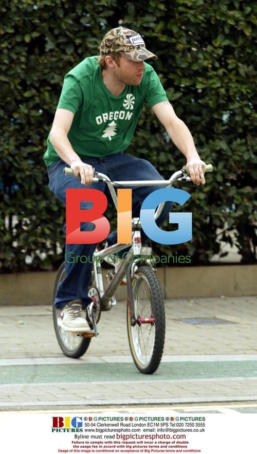 Damon Albarn Bikes Through Notting Hill