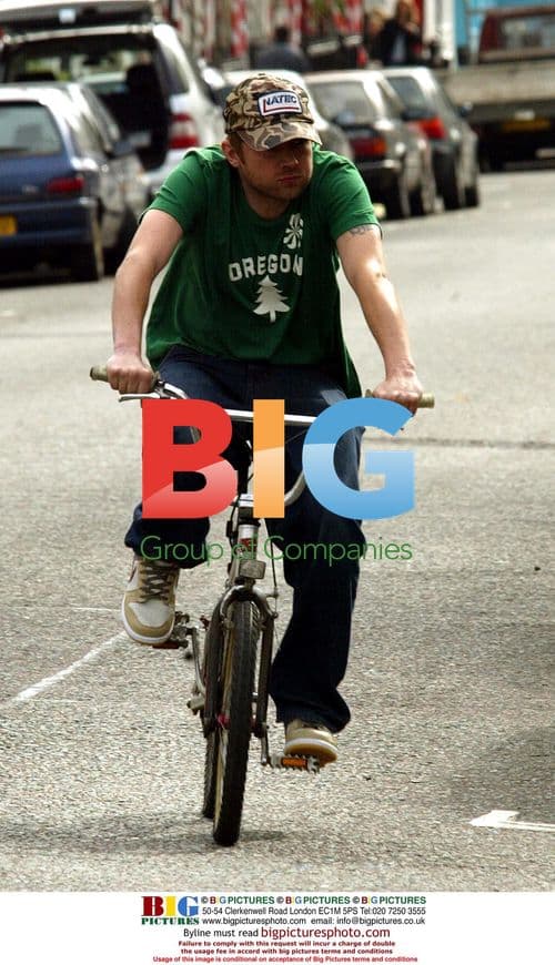 Damon Albarn Cycling in Notting Hill