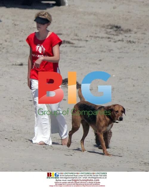 Charlize Theron with Dogs at Beach House