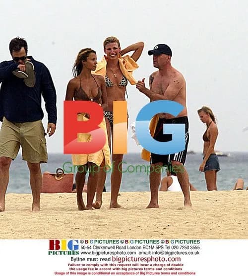 Bruce Willis Plays Air Guitar in St. Tropez