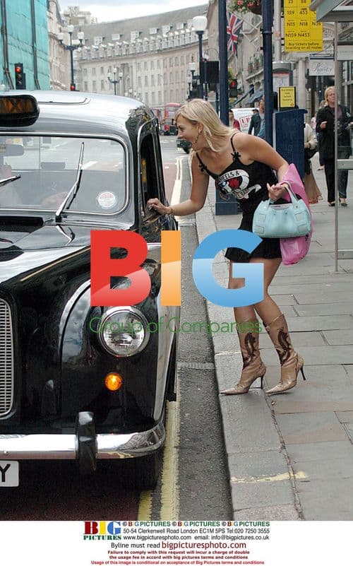 Liz Fuller Out Shopping in London