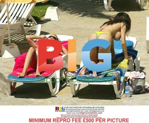 Page 3 Models Tanning by Pool in Tenerife