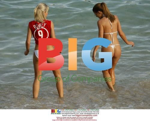 Models Tanya and Kayle play on beach