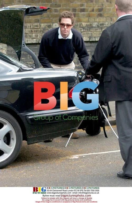 Hugh Grant Packing Bags Before Driving Off