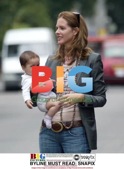 Trinny Woodall and daughter hailing cab