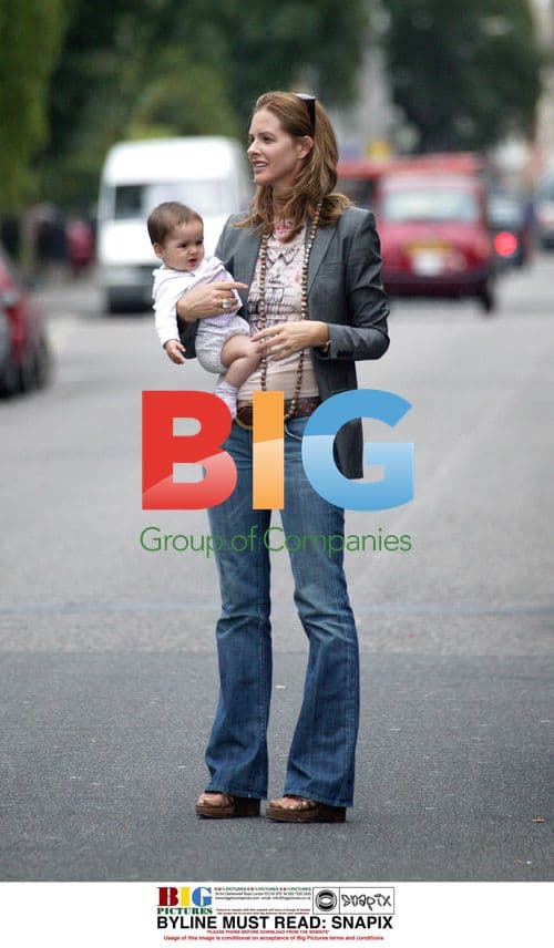 Trinny Woodall and Daughter Tiger Lily Hail Cab