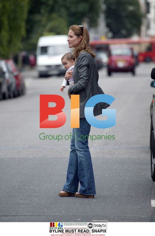 Trinny Woodall and Daughter Hailing Cab