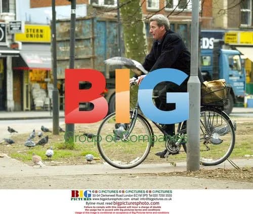 Jeremy Paxman Cycling in Notting Hill