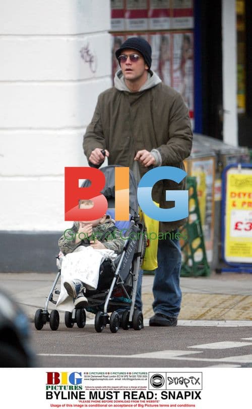 Scott Maslem with son Zak and partner in London