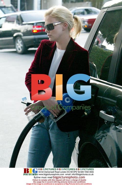 Charlize Theron Pumping Gas in Hollywood