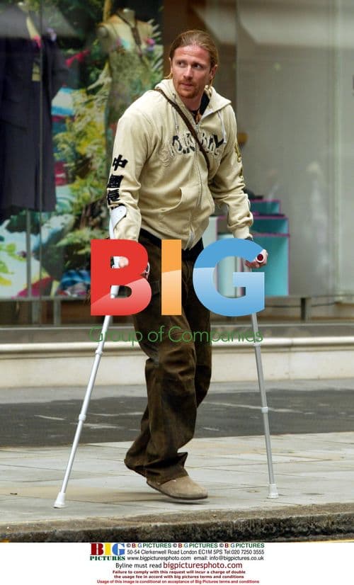 Emmanuelle Petit on Crutches