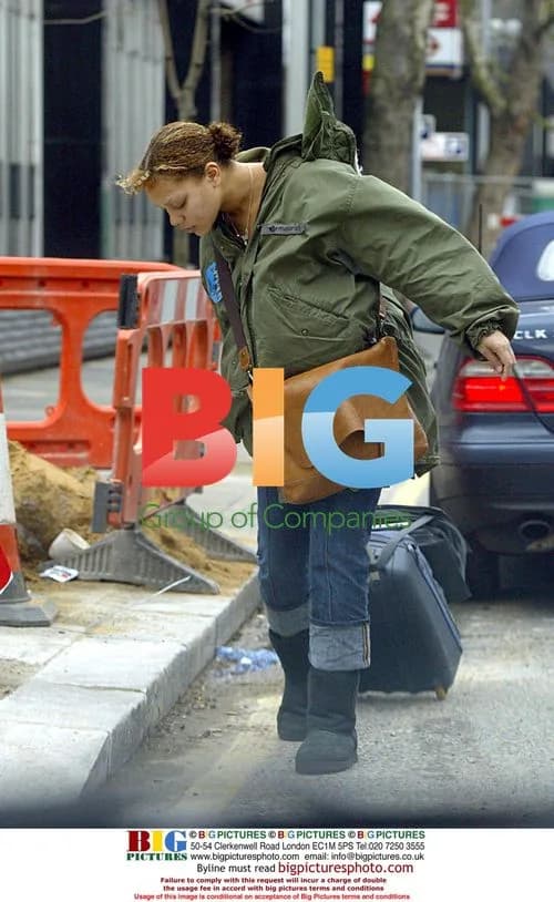 Pregnant Angela Griffin Kissing Boyfriend