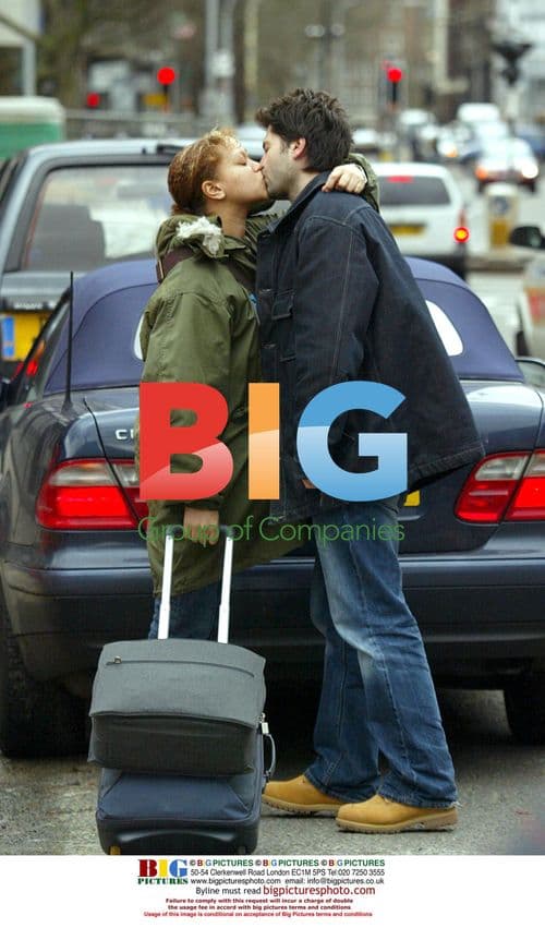 Pregnant Angela Griffin Kissing Boyfriend at Euston