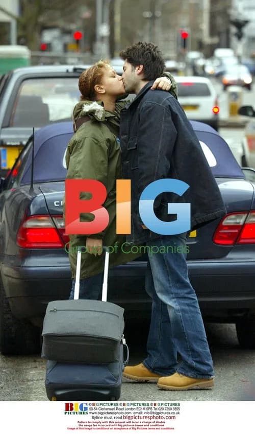 Pregnant Angela Griffin Kissing Boyfriend at Euston