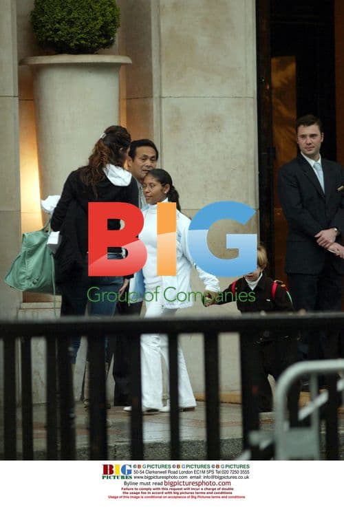 Luciana Morad and Son Lucas Shopping in Paris