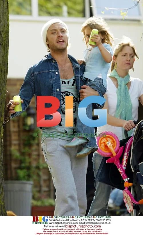 Jude Law walks with kids and dogs
