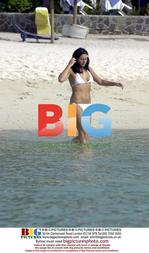 Carla Romano Relaxes on Beach