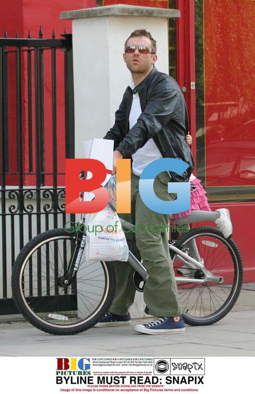 Damon Albarn with daughter on BMX