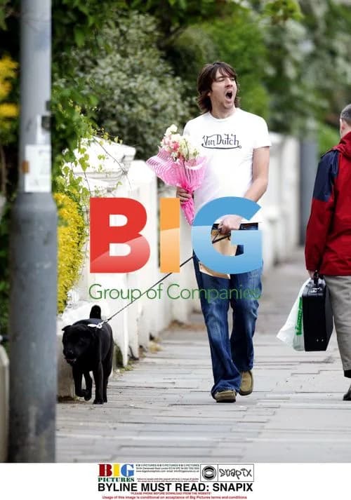 Dan Hipgrave out with flowers for wife