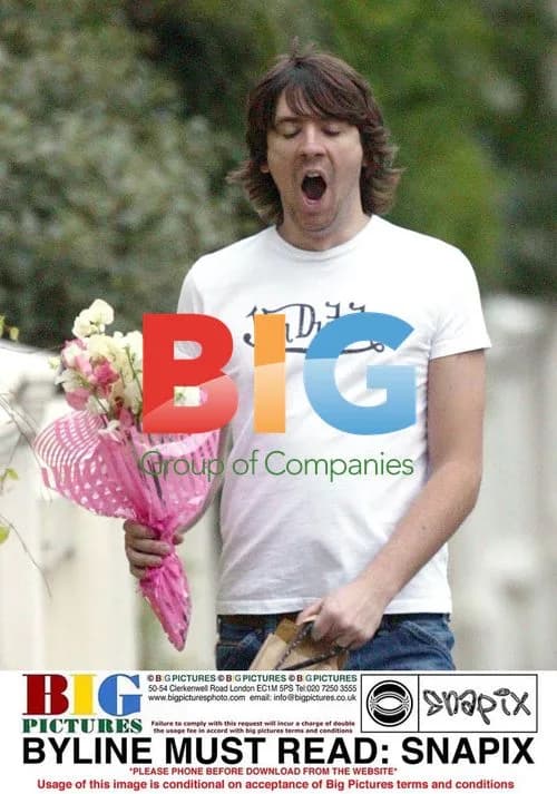 Guitarist Dan Hipgrave with flowers for wife