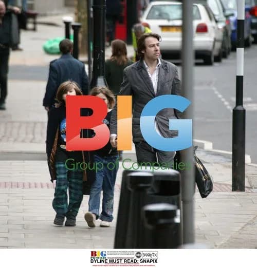Jonathan Ross with children shopping in London