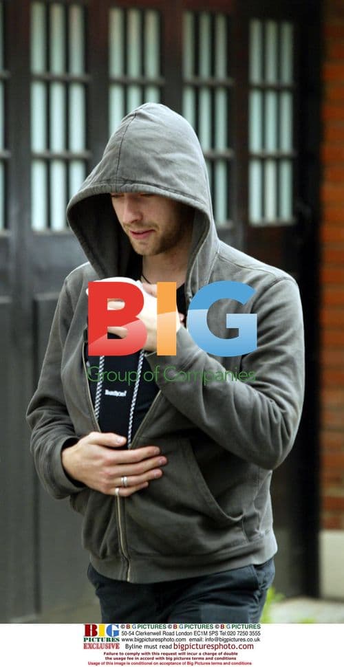 Chris Martin Seen with Baby Apple