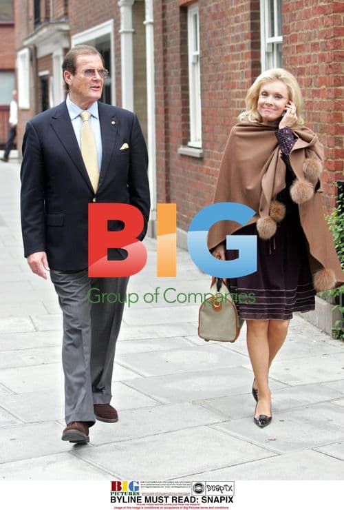 Roger Moore and Wife Out Walking