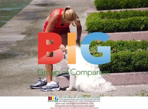 Anneka Svenska with Dog in Park