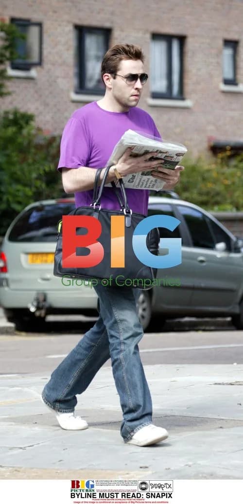 David Walliams Seen Reading Newspaper in London