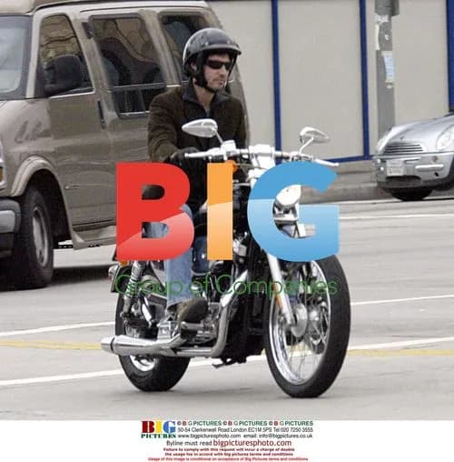 Keanu Reeves rides Harley in Hollywood