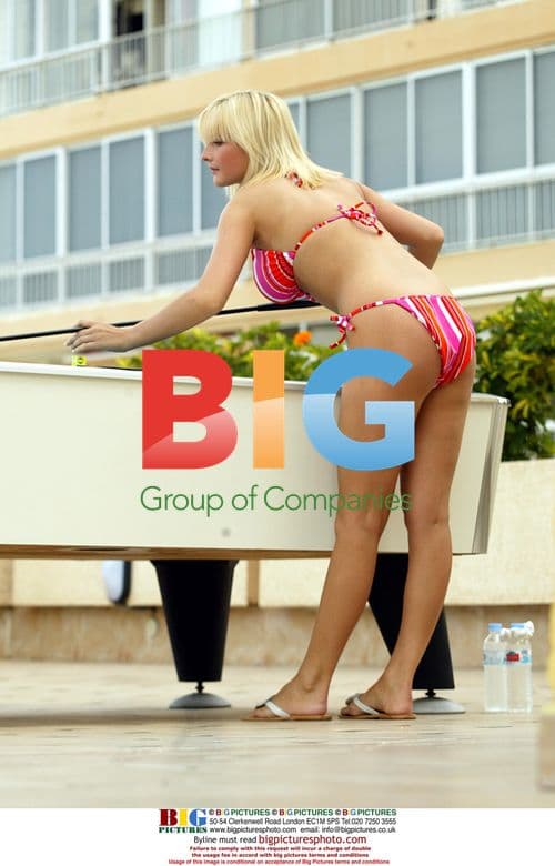 Glamour models Michelle Marsh and Jo Hicks play snooker in Spain