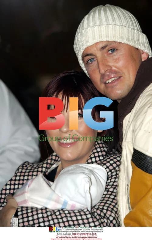 Jessie Wallace with fiance and baby