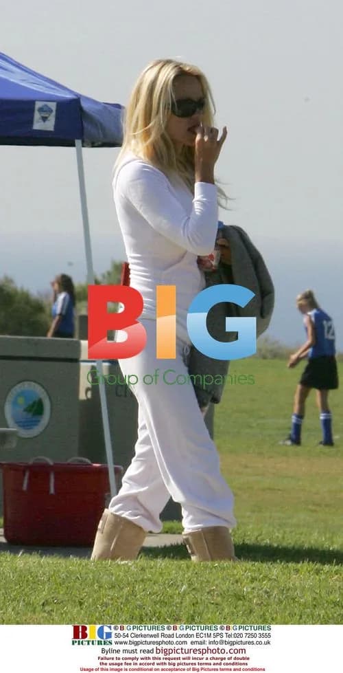 Pamela Anderson Watches Sons Play Football