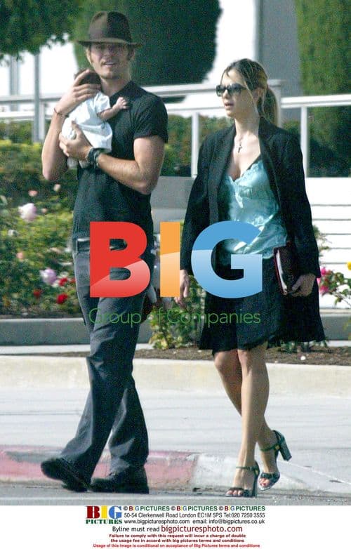 Mira Sorvino and Chris Backus with Newborn Daughter