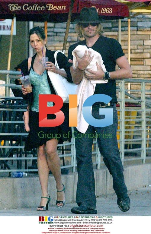 Mira Sorvino and Chris Backus with Newborn Daughter