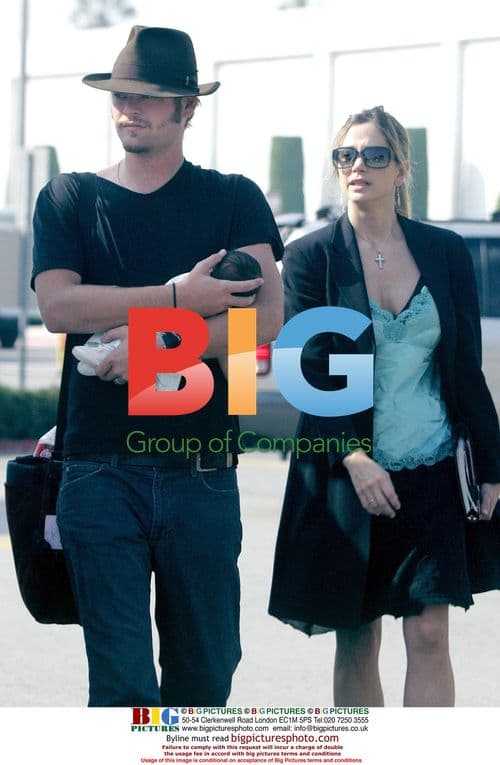 Mira Sorvino and Chris Backus with Newborn