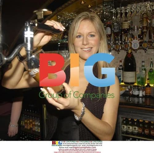 Abi Titmuss Pulling Pints at Bennigan's Pub