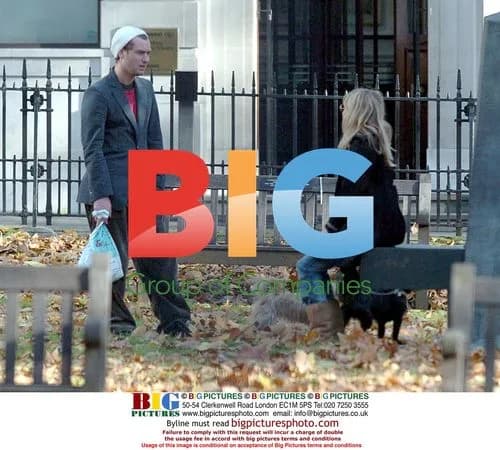 Jude Law and Sienna Miller in Berkley Square, London