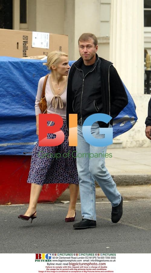 Roman Abramovich walks with wife Irina in London